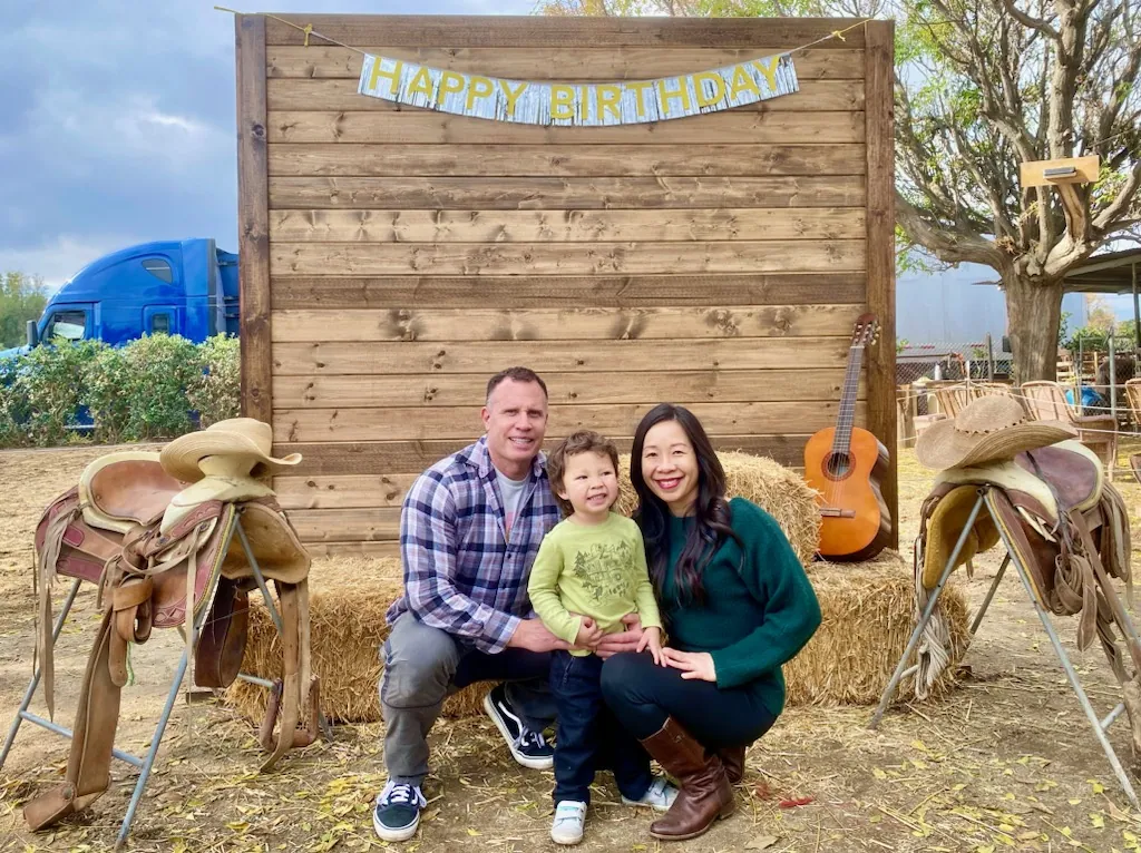 Family portrait at the ranch backdrop — Rancho Lagunas outdoor ranch event venue in Bloomington, California