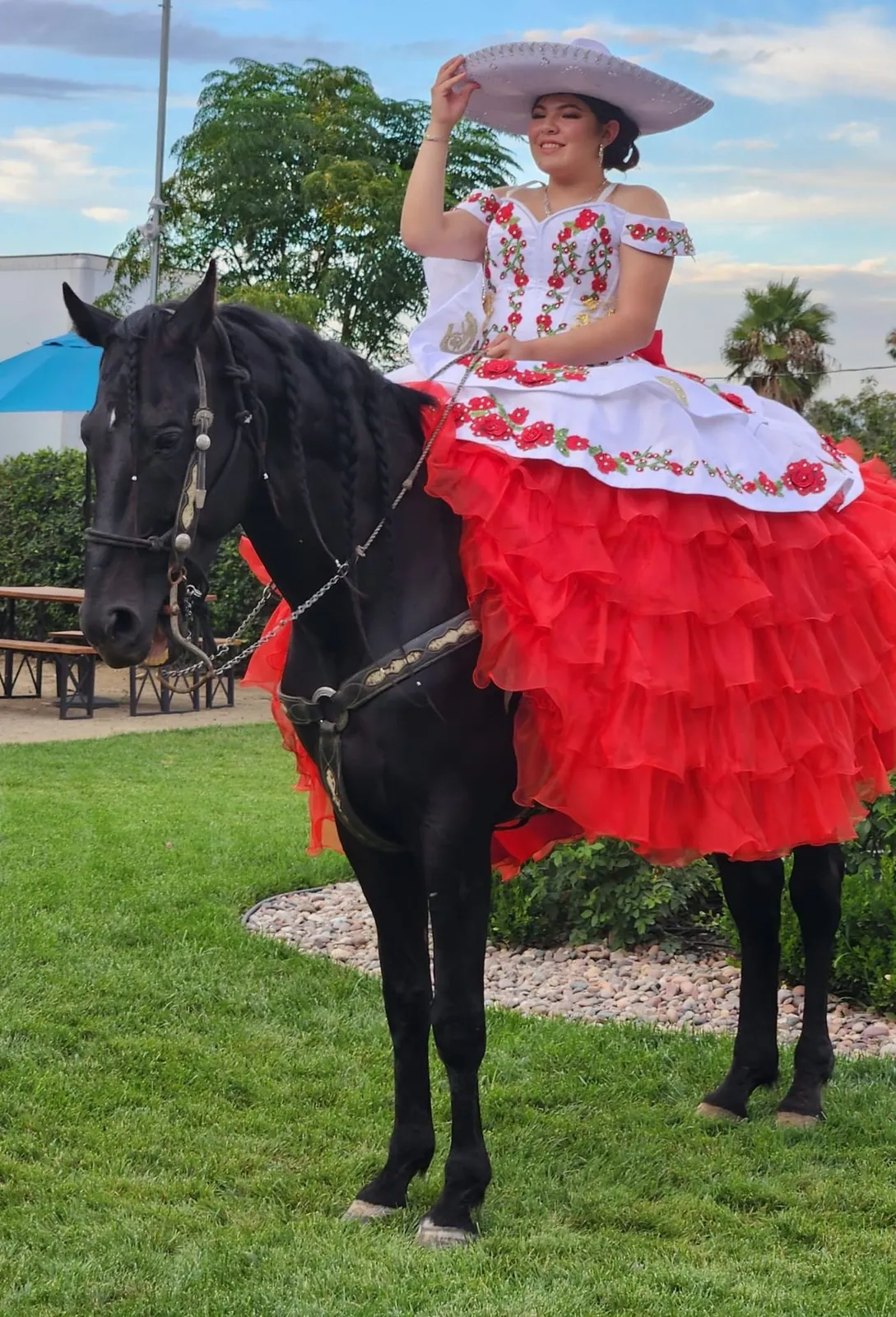 Quinceañera portrait with dancing horse — Rancho Lagunas outdoor ranch event venue in Bloomington, California