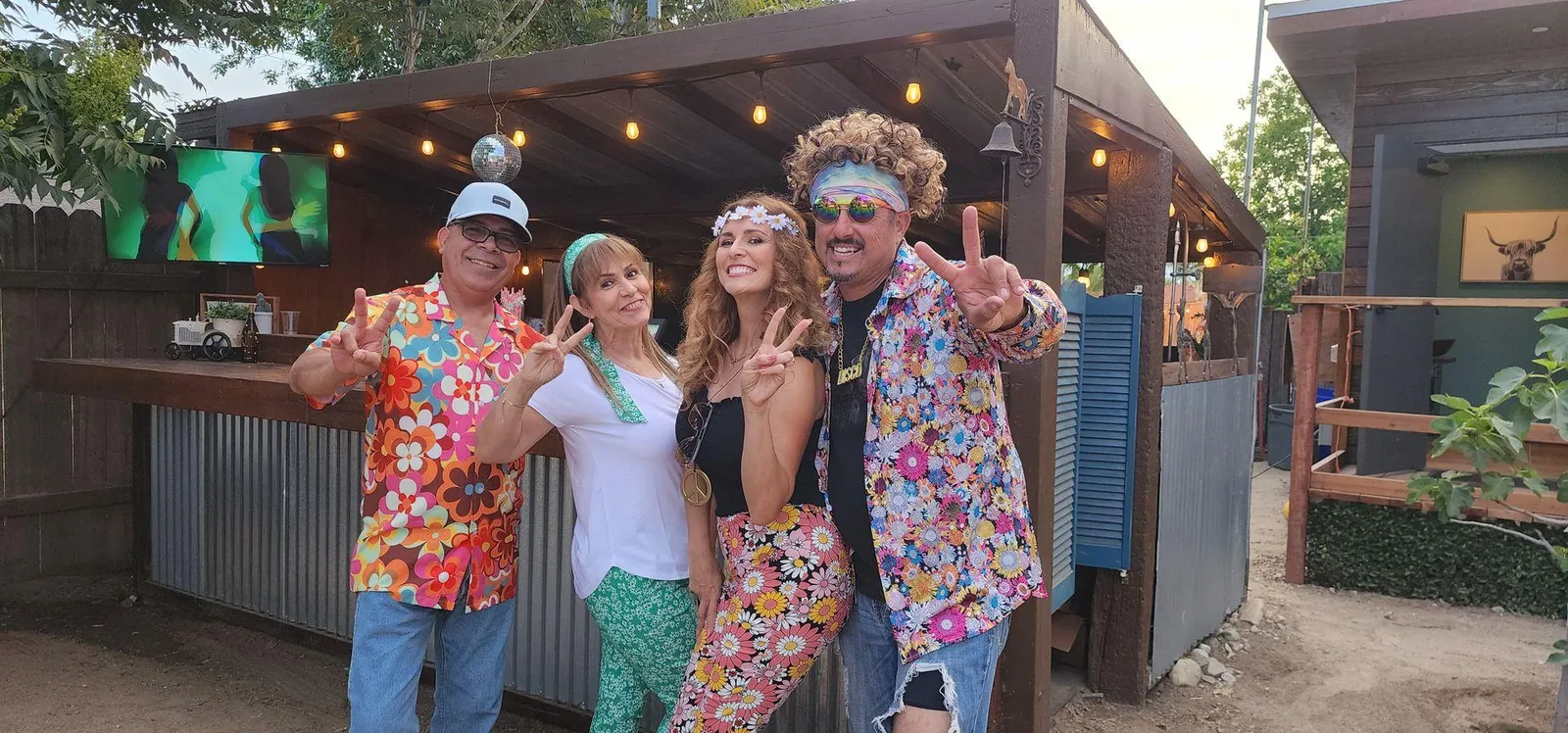 Guests at the rustic barn bar — Rancho Lagunas outdoor ranch event venue in Bloomington, California