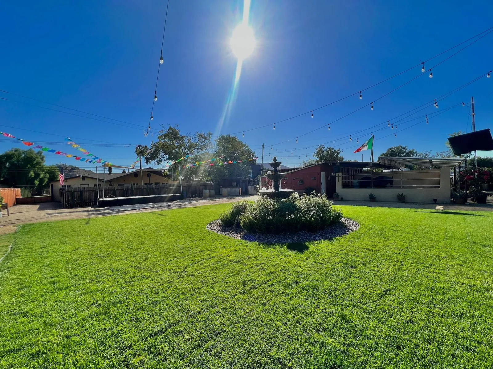 Open lawn ceremony space — Rancho Lagunas outdoor ranch event venue in Bloomington, California