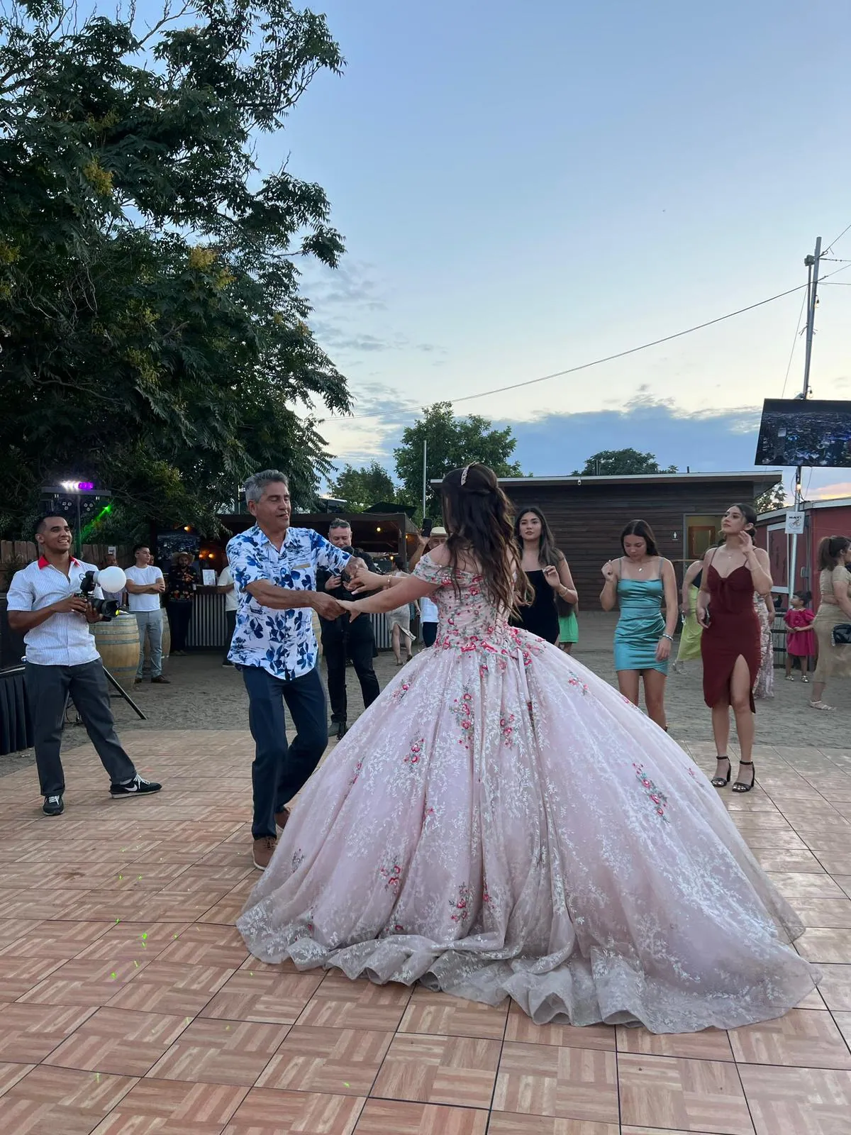 Quinceañera entrance across the ranch — Rancho Lagunas outdoor ranch event venue in Bloomington, California